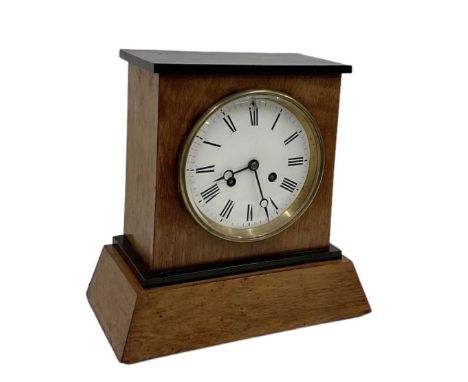 A 19th century mahogany and ebonised French mantel clock, the movement manufactured by R &amp; C Paris and London, the white 