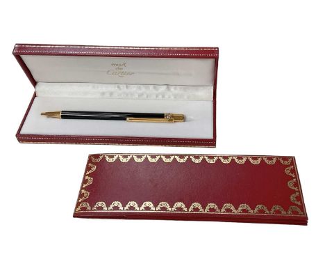 MUST DE CARTIER; a cased vintage ballpoint pen.