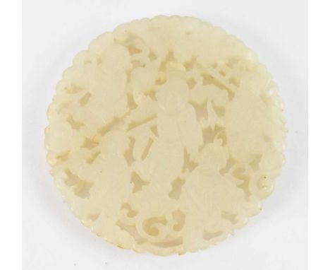 A Chinese carved white jade bi disc, decorated with cavorting figures, diameter 5cm.