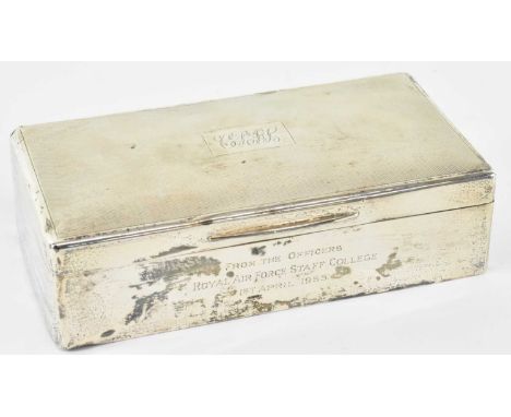 A George V hallmarked silver cigarette box, London 1928, inscribed to the top with initials, 17 x 9cm.
