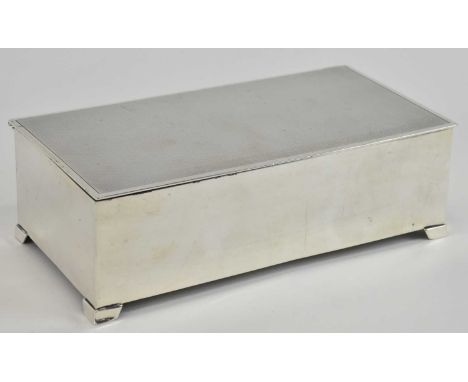 MAPPIN &amp; WEBB LTD; a George V hallmarked silver rectangular cigarette box, inscribed with initials 'M.I.C', London 1930, 