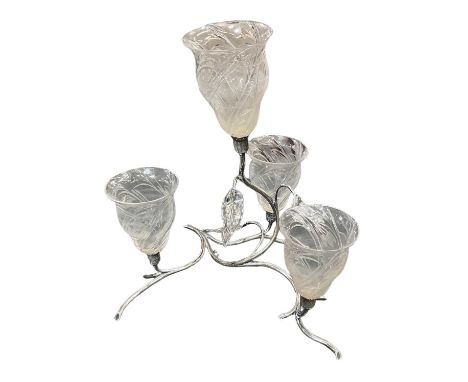 An early 20th century silver plated four branch epergne, the base modelled as scrolling leaves and branches, the clear glass 