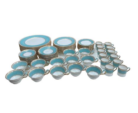 WEDGWOOD; a twelve setting tea and coffee service, with pale blue and gilt border, comprising twelve dinner plates, twelve sa