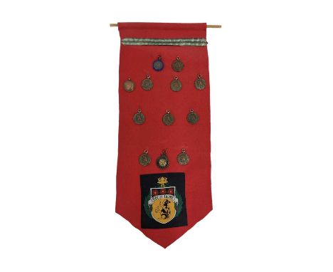 BACUP INTEREST; a hallmarked silver Bacup and Rawtenstall Grammar School medallion, two bronze prize medallions for Bacup and
