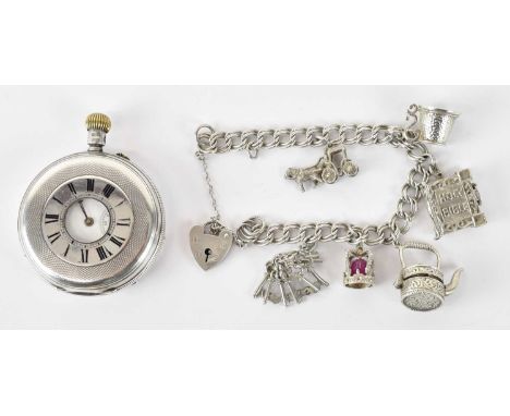 A Victorian hallmarked silver half hunter cased crown wind pocket watch, the white enamel dial set with Roman numerals, diame