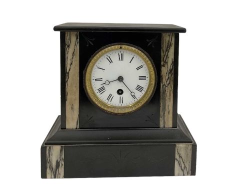 A Victorian slate mantel clock, the white enamel dial set with Roman numerals, height 22.5cm.