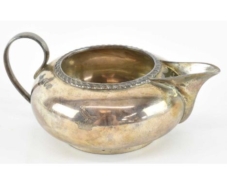 HUKIN &amp; HEATH LTD; a late Victorian hallmarked silver milk jug of squat form, London 1896, height 6cm, approx 4.84ozt/150