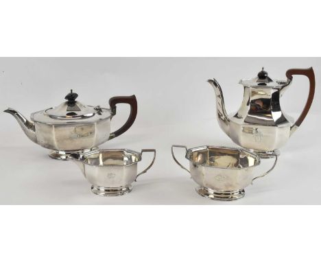 ADIE BROTHERS LTD; a George VI hallmarked silver three piece tea service comprising teapot, twin handled sugar bowl and milk 