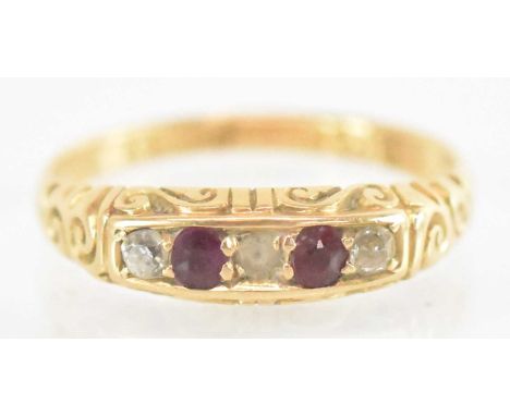 An 18ct yellow gold ruby and diamond set ring, size N/O, approx 3.3g.