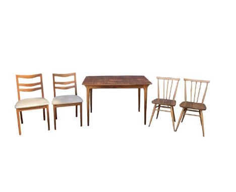 G PLAN; a mid century teak extending dining table with two chairs, 114 x 82cm, also two Ercol blonde elm stick back chairs.