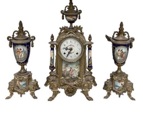 A reproduction French gilt metal and porcelain mounted garniture comprising mantel clock with a pair of faux urns, height 41.