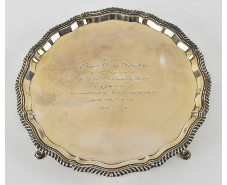 GARRARD &amp; CO LTD; a modern hallmarked silver salver, inscribed 'Presented to Ernest George Brooks by directors of the De 
