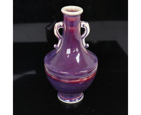 A Chinese lilac glaze pottery baluster vase, with seal mark on base, height 22cm 