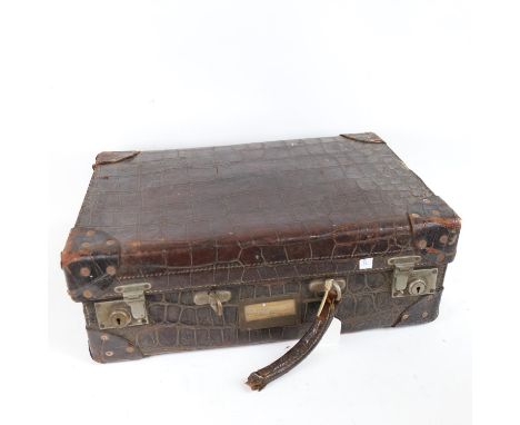 A Vintage crocodile suitcase 