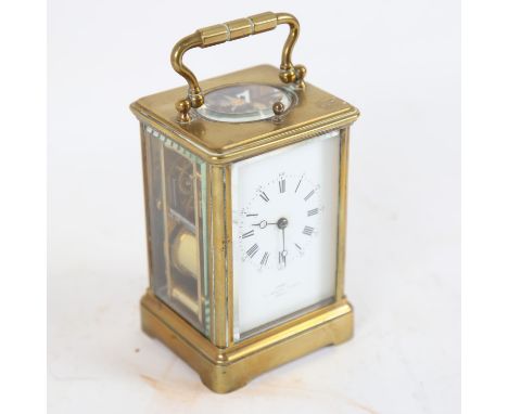 A brass-cased repeating carriage clock, by Dent of London, white enamel dial with Roman numeral hour markers, glass exhibitio