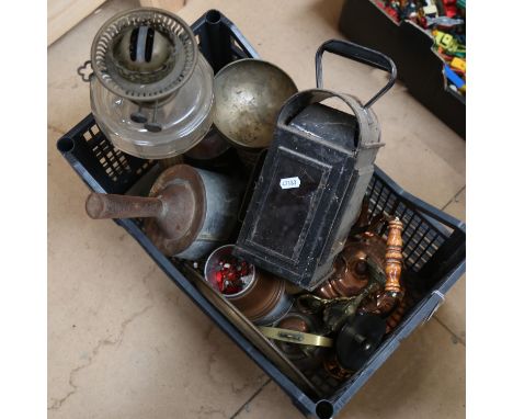 A lantern, an oil lamp, a scoop, and other brass and copperware 