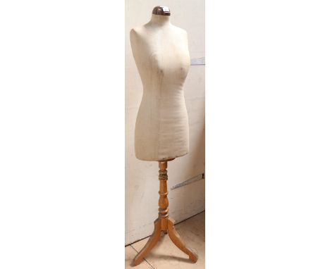 A Vintage mannequin on turned wood tripod base 