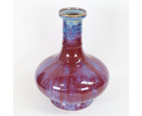 A Chinese sang de boeuf pottery squat bottle vase, seal mark on base, height 24cm 