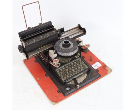 An early 20th century German tinplate toy Junior typewriter, by Gebruder Schmidt Nuremberg (GSN), circa 1920 