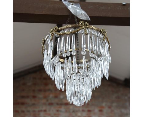 A brass-framed 3-tier ceiling light fitting, with glass drops, frame height approx 30cm 