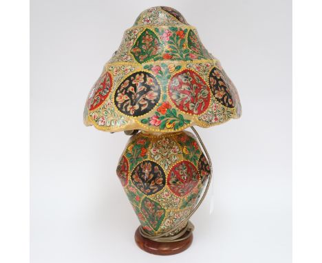 A table lamp with painted floral panels, and matching painted skin(?) shade, height 55cm 