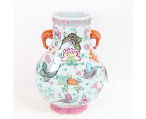 A Chinese famille rose hu form vase, butterfly and chrysanthemum decoration, with seal mark on base, height 27cm 