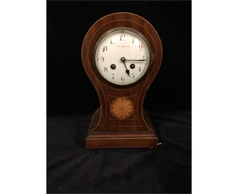 A Mappin and Webb Balloon mantle clock with inlay.