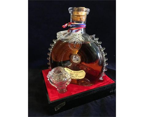 A bottle of Louis XIII Remy Martin Cognac in a presentation case (Damaged cork)