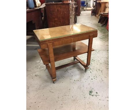 A Mid Century card table on castors