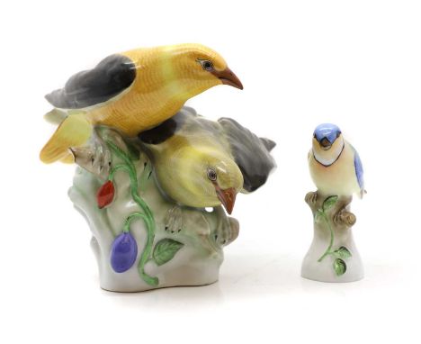 Two Herend porcelain figures 20th century, printed marks, comprising of a pair of yellow hammer birds, 17cm high, and a blue 