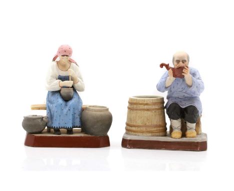 Two Gardner bisque porcelain figures c.1880, Russian, Verbilki, Moscow, of a peasant woman churning butter,red printed factor