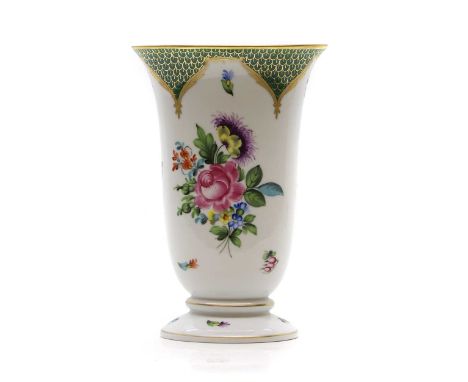 A Herend porcelain vase 20th century, with painted floral decoration, to green and gilt borders, printed marks,20cm highCondi