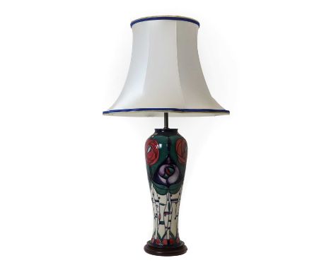 A Moorcroft pottery ‘Mackintosh’ table lamp, modern, with a satin shade, 73cm highCondition ReportNo bulb, good overall.