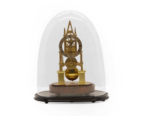 A brass architectural skeleton clock 19th century, the gothic frame with six turned baluster-shaped pillars, mounted on a pai