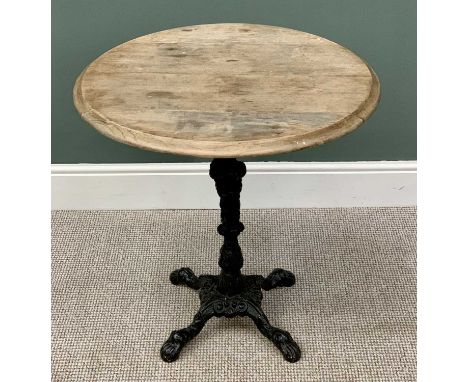 CIRCULAR TOP PUB TABLE - on a four footed cast iron base, 74cms H, 69cms diameter