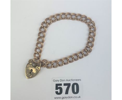 9k gold gate bracelet with heart lock, 7.5” long, w: 12.1 gms