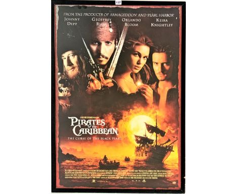 Framed film poster ‘Pirates of the Caribbean, The Curse of the Black Pearl’, signed by Johnny Depp with Certificate of Authen