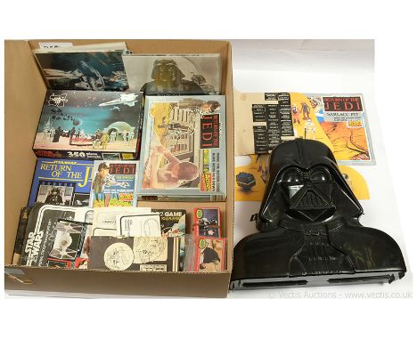 Quantity of vintage Star Wars collectables including Darth Vader Carry Case, vintage vehicle instructions, Jigsaw, R2-D2 game