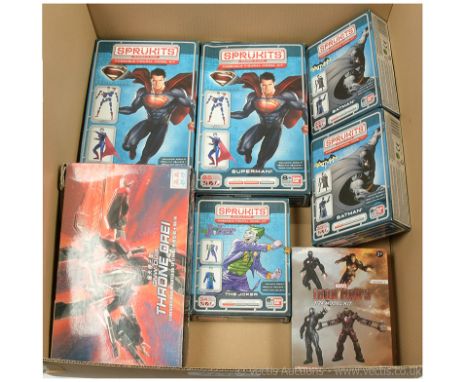 Quantity of Super Hero related model kits x seven including Ban Dai Sprukits The Joker (4"), Batman (4") x 2, Superman (5") x