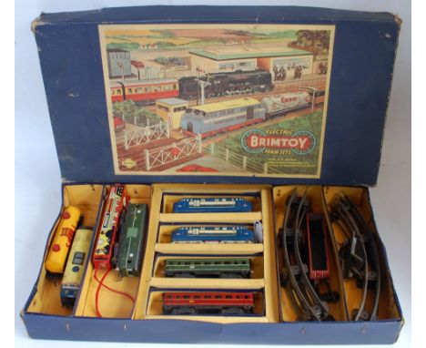 Brimtoy electric train set containing 2x D5001 diesel engines (plus another incomplete ), 2x green bogie coaches, one red bog