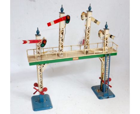Hornby 1935/36 No. 2 signal gantry with green bridge lining lighter blue bases, ladder and finials, red levers, home and red 