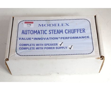 A Modelex automatic steam chuffer with speaker and transformer (G-BG)