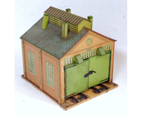 Hornby 1928/33 No. 1 clockwork engine shed on yellow/cream base, yellow ridge tiles, inside of doors printed, some corrosion 