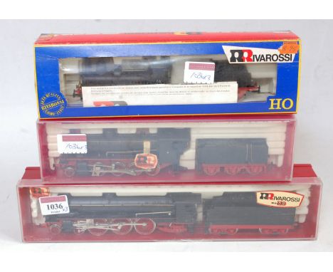 Rivarossi Ref. 1118 H0 4-6-2 engine and tender, and Ref. 1121 2-8-0 engine and tender both FS railways, black, both in plasti