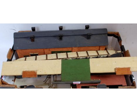 Large tray of Bassett-Lowke wooden accessories including turntable, single engine shed with 10 assorted metal advertising sig