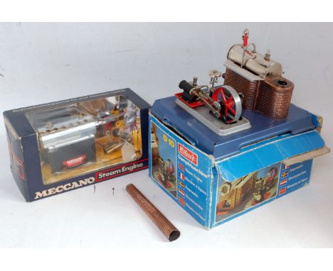 A Wilesco and Meccano boxed stationary steam group to include a Wilesco D10 stationary steam plant, appears complete in the o