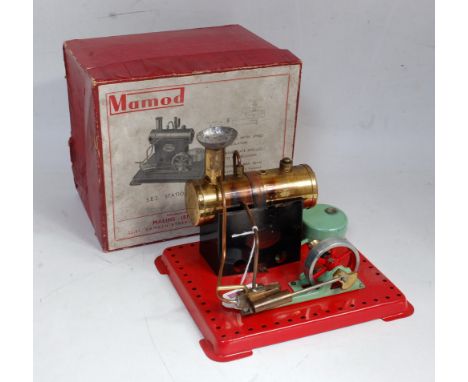 An early Mamod SE2 stationary steam engine comprising of copper housed boiler powering a single oscillating cylinder with tak