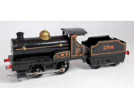 Hornby 1925/27 black LMS clockwork No. 0 loco with lined crest on cabside unlined boiler brass dome, creases to sides, loco a