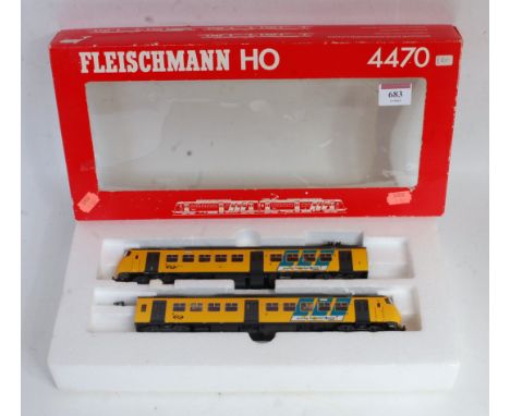 A Fleischmann H0 yellow livery Netherlands Railway, 2 car electric multiple unit, box window damaged (G-BD)