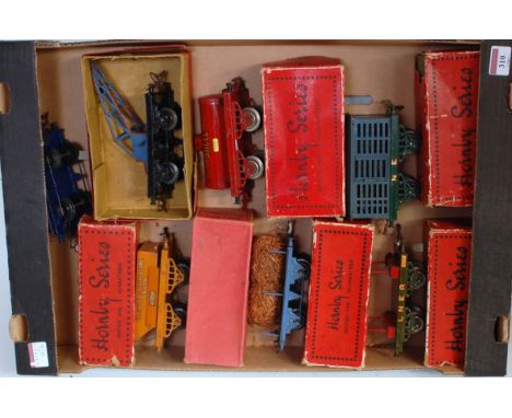 Large tray containing 7 boxed Hornby pre-war wagons including 1933/39 plain gas cylinder wagon (G-BP), 1935/38 plain crane tr
